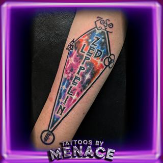 Color Led Zeppelin airship tattoo on the forearm