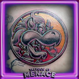 Color gargoyle medallion tattoo