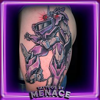 Color Transformers Megatron tattoo on the arm