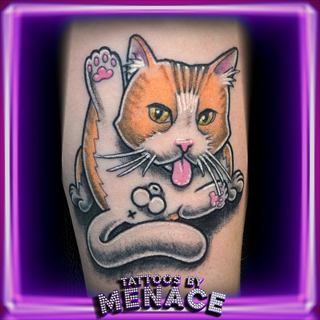 New school color cat tattoo on the upper arm